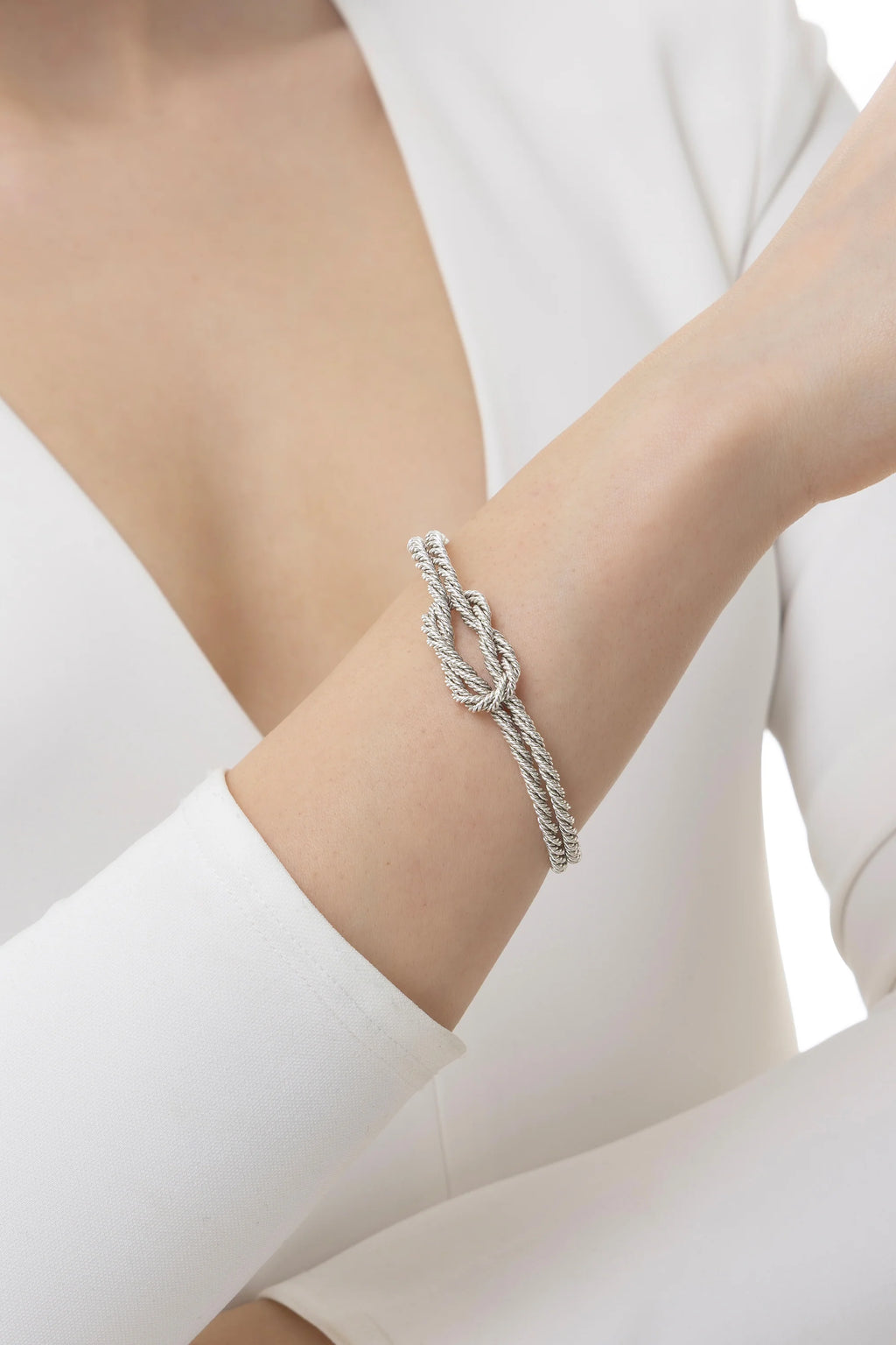 Bracciale rigido effetto corda